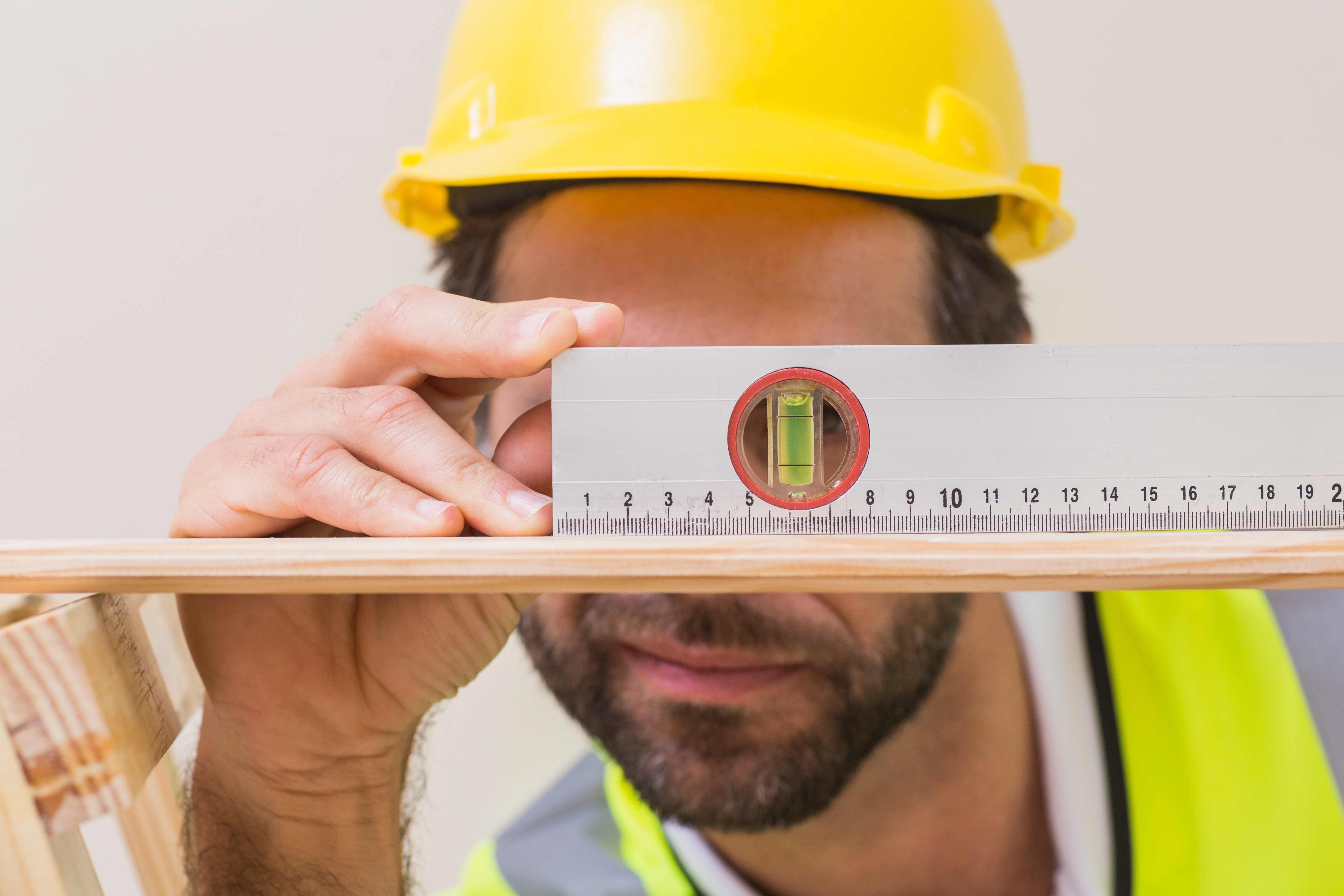 A man using spirit level